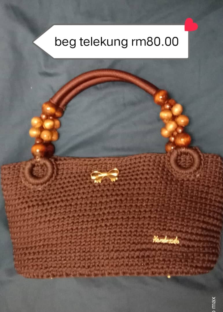 Mengait beg telekung