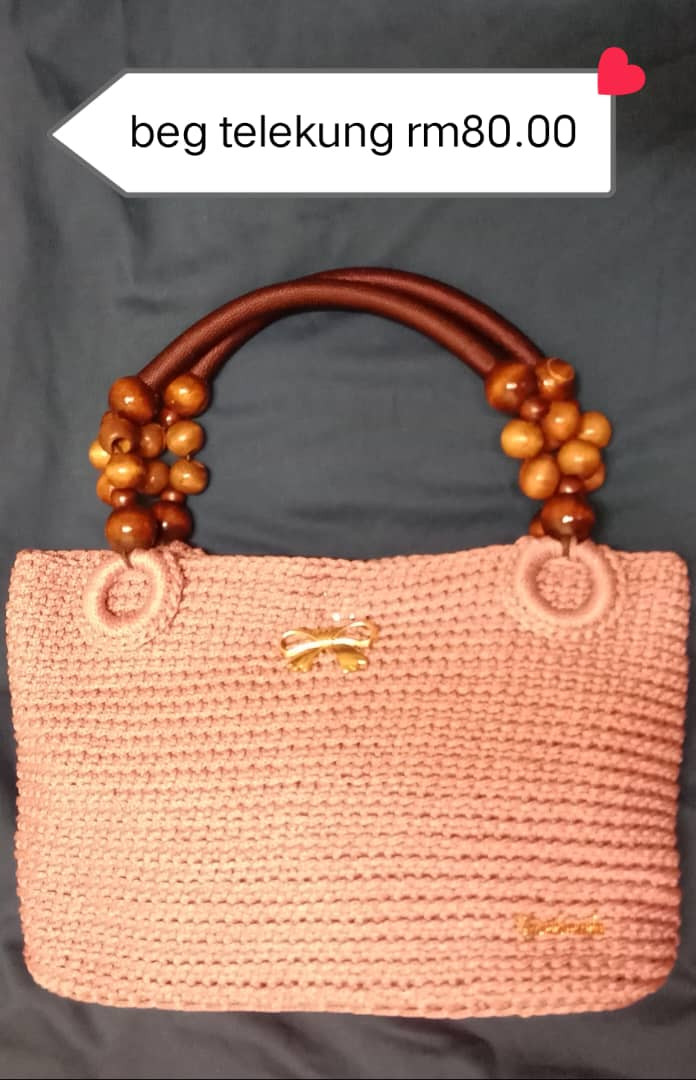 Mengait beg telekung